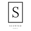 Framed letter 'S' with 'SCENTED PARIS' text on a white background